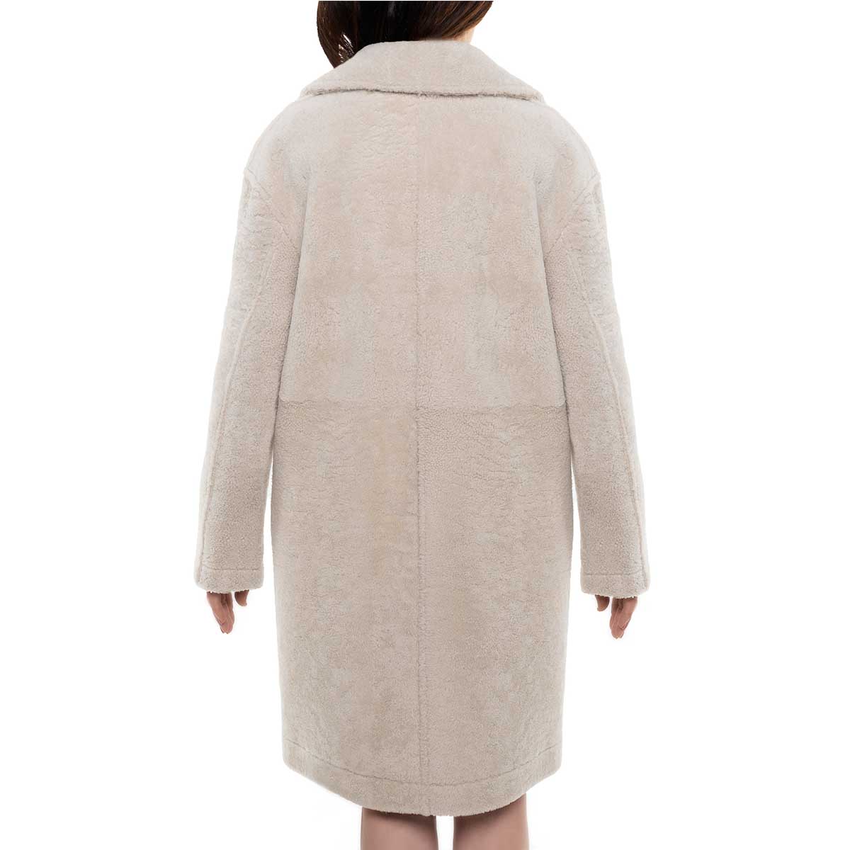 Long beige women's sheepskin coat with buttons